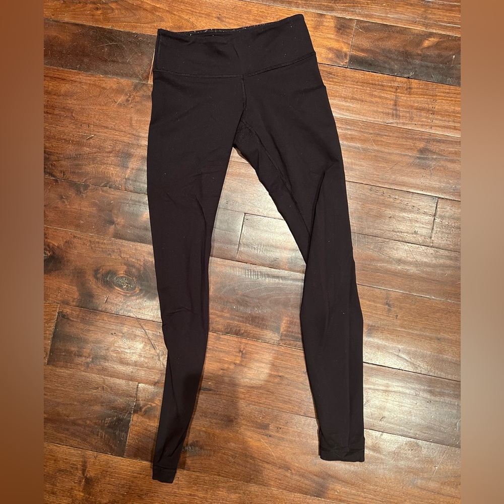 Lululemon size 4 leggings. Thick and warm material.